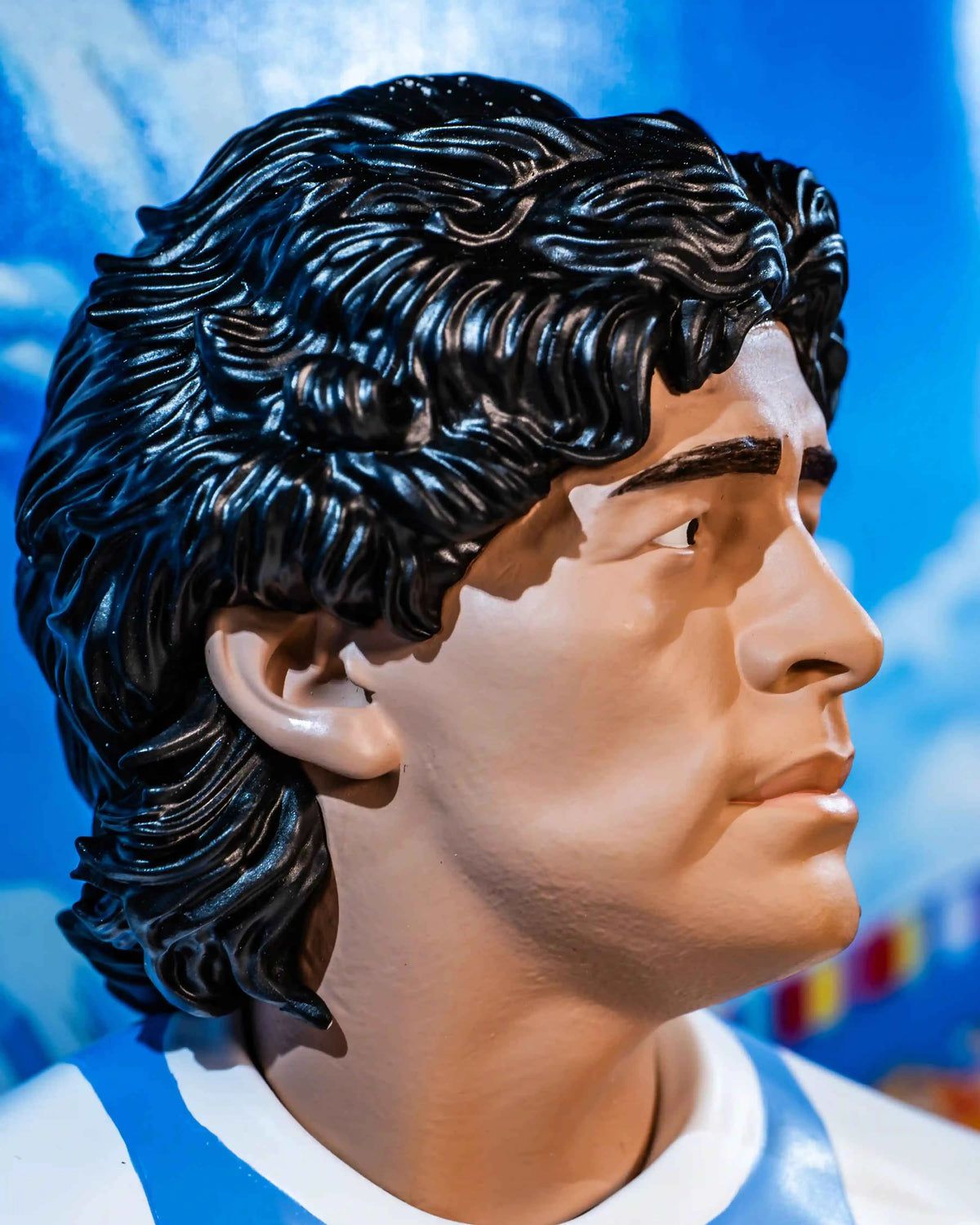Décor immersif Coupe du Monde 1986 derrière la figurine Maradona